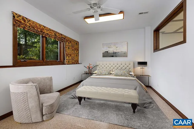 a living room with furniture and a couch