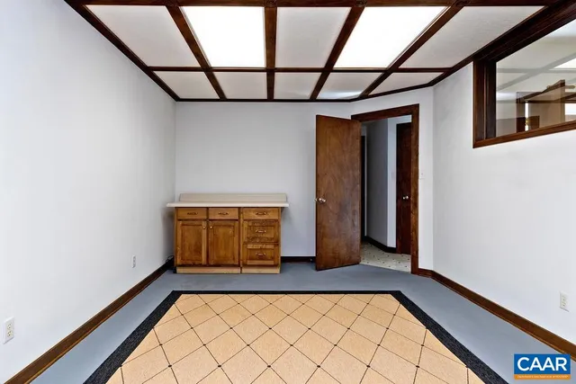 a view of a door and a window