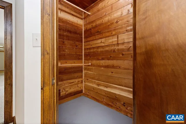 a balcony with wooden floor and fence