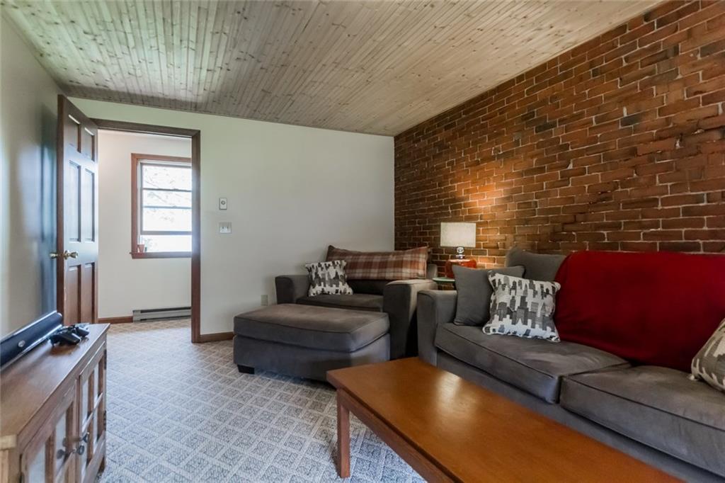 19 Capisic Street Portland, ME 04102 - Photo 34 of 35 Apartment living room with original...