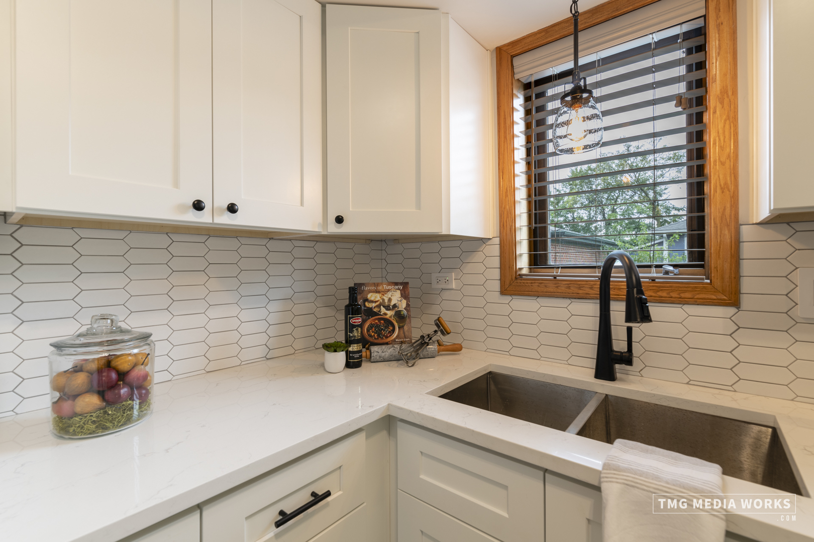 616 East 5th Avenue, Unit 101 Naperville, IL 60563 - Photo 12 of 57 a kitchen with a sink and cabinets