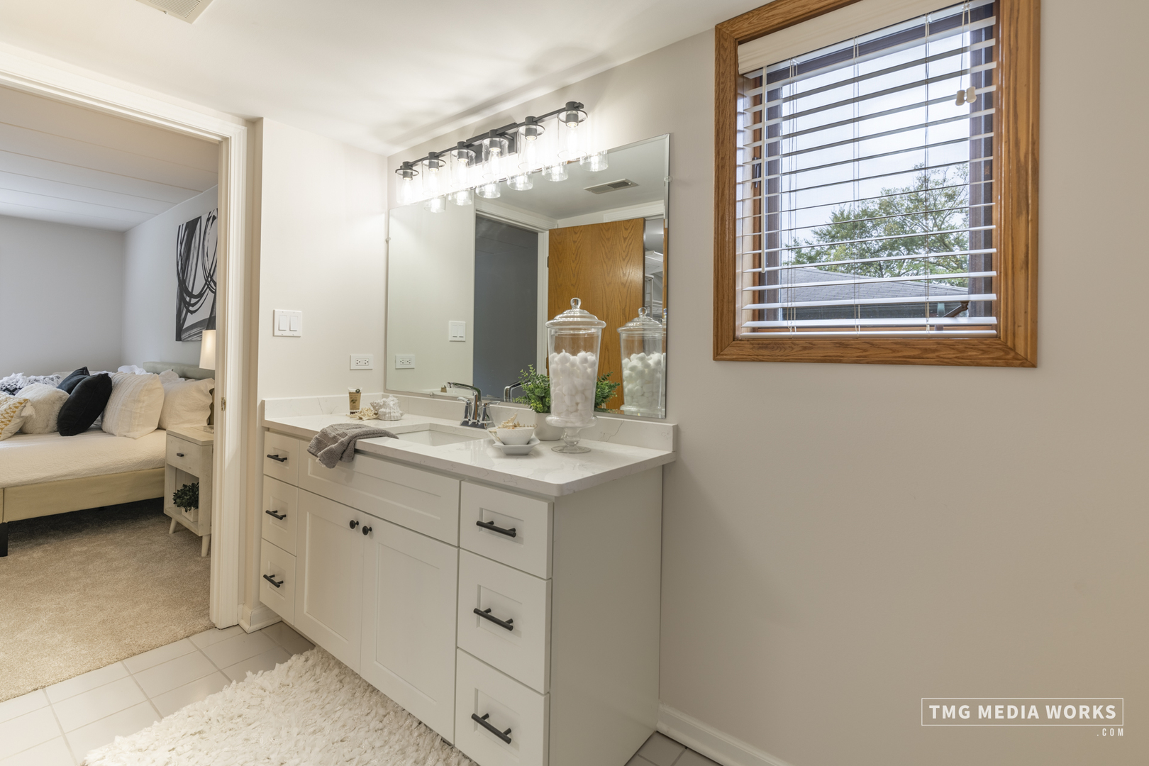 616 East 5th Avenue, Unit 101 Naperville, IL 60563 - Photo 19 of 57 a bathroom with a sink double vanity and a mirror