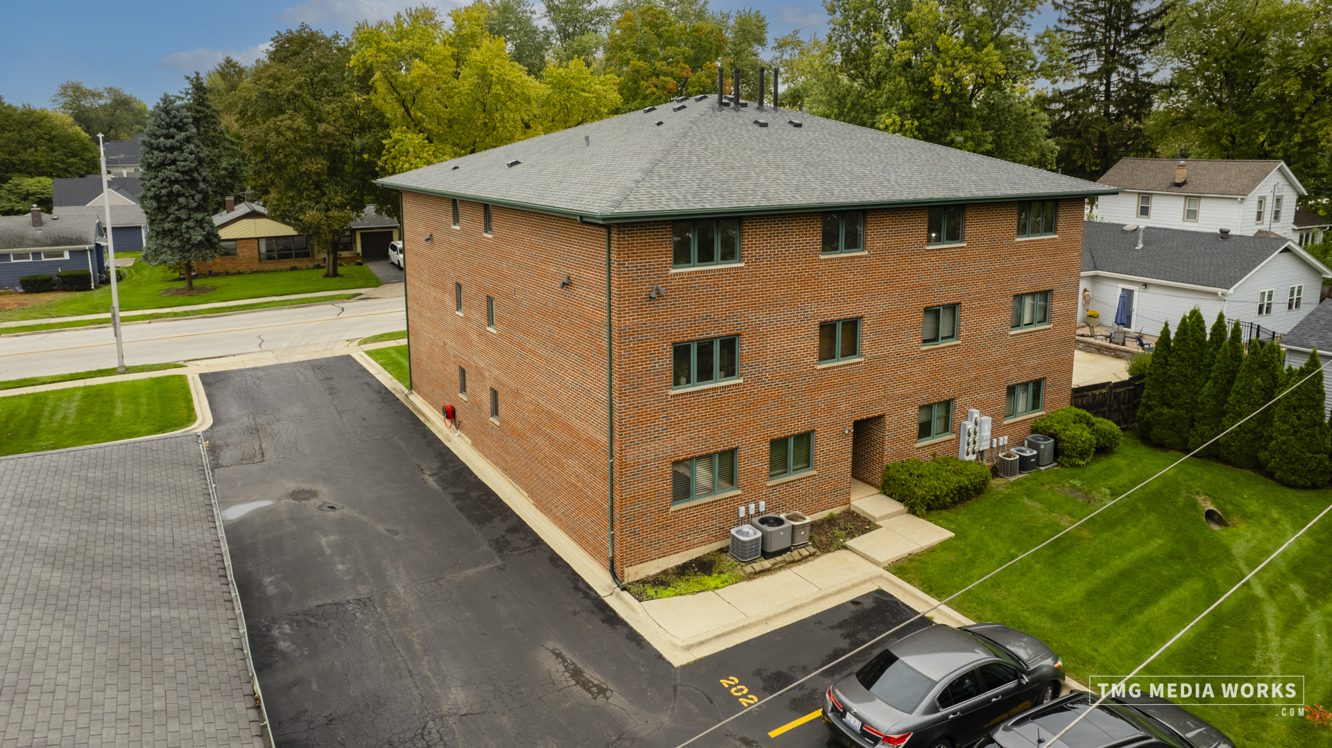 616 East 5th Avenue, Unit 101 Naperville, IL 60563 - Photo 32 of 57 a aerial view of a house with backyard
