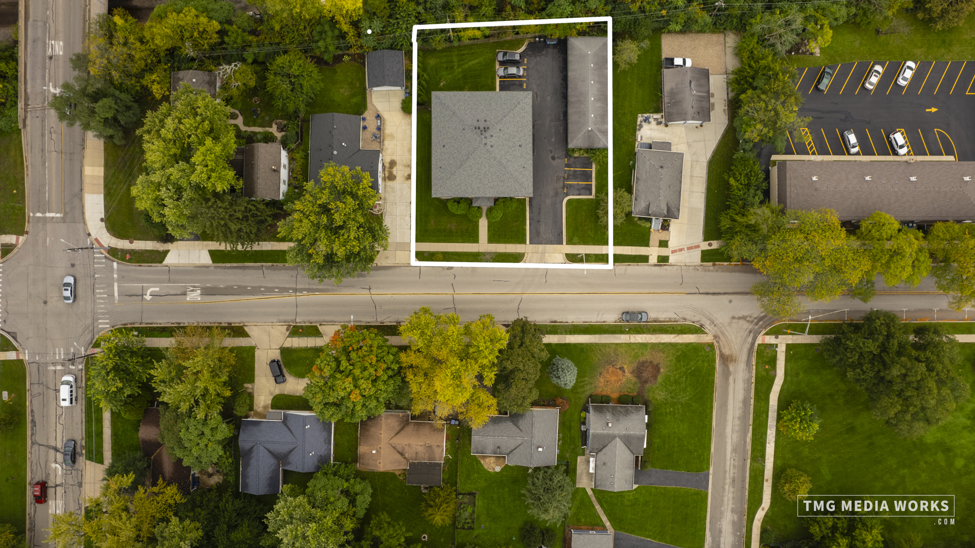 616 East 5th Avenue, Unit 101 Naperville, IL 60563 - Photo 33 of 57 aerial view of a house with a swimming pool and garden