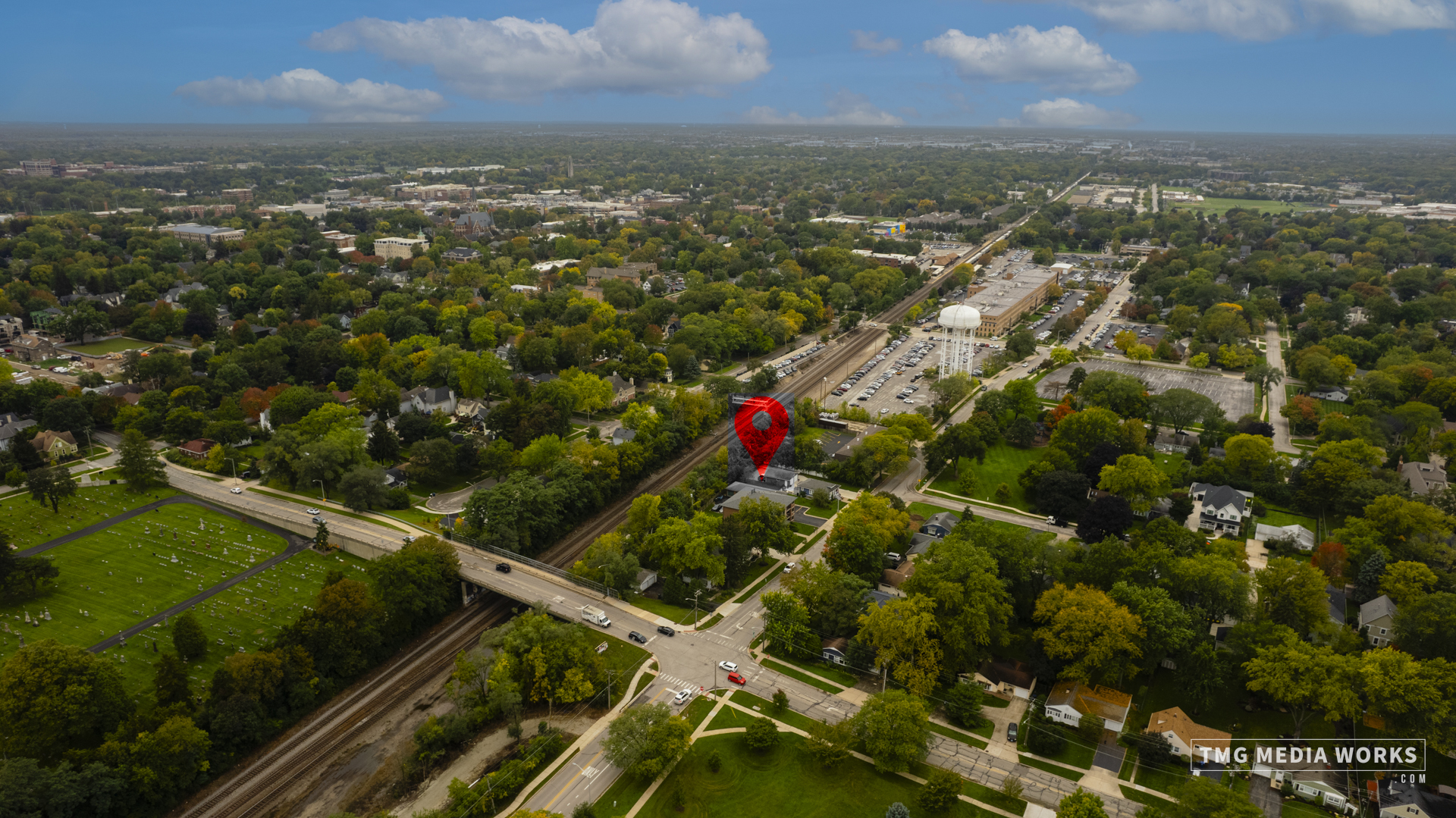 616 East 5th Avenue, Unit 101 Naperville, IL 60563 - Photo 35 of 57 an aerial view of residential houses with outdoor space and trees