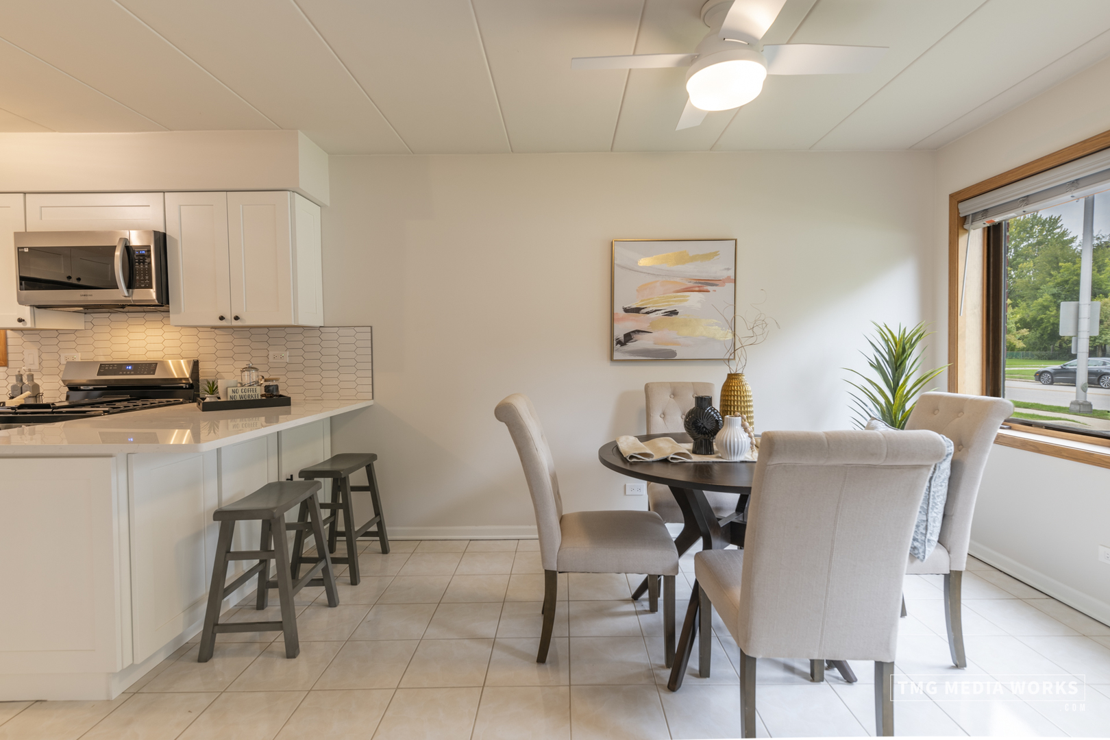616 East 5th Avenue, Unit 101 Naperville, IL 60563 - Photo 5 of 57 a view of a dining room with furniture and a window