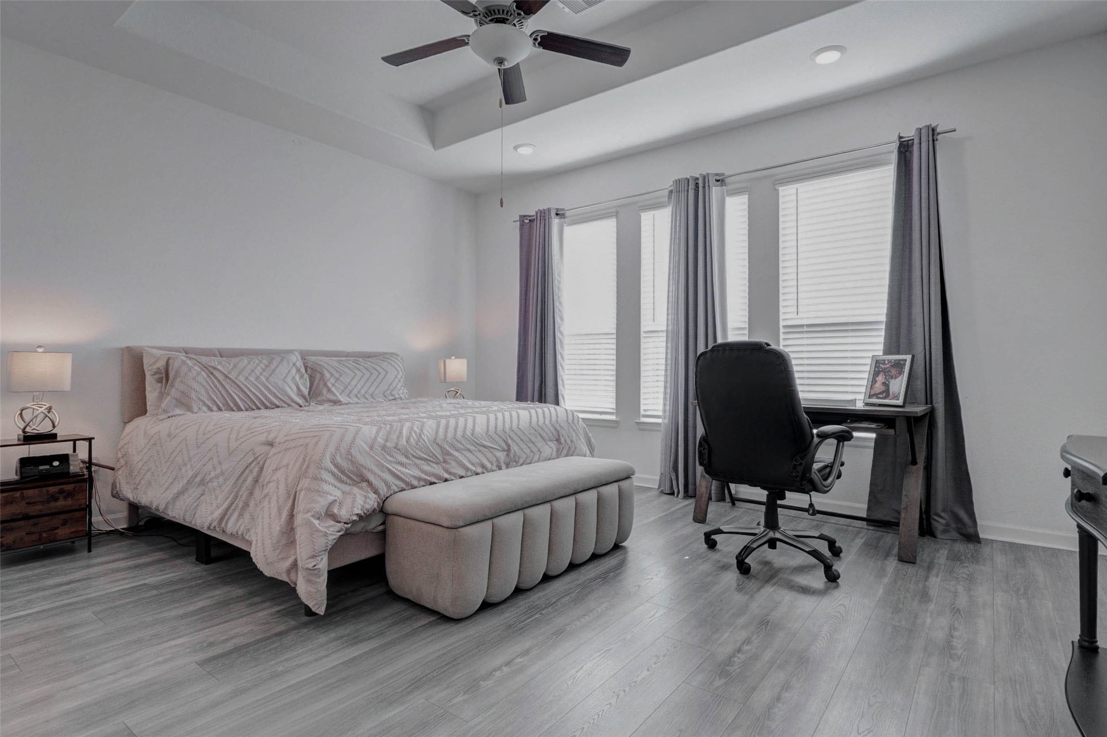 3711 Castle Rock Drive Rosenberg, TX 77469 - Photo 25 of 46 a bedroom with a bed a desk chair and a window