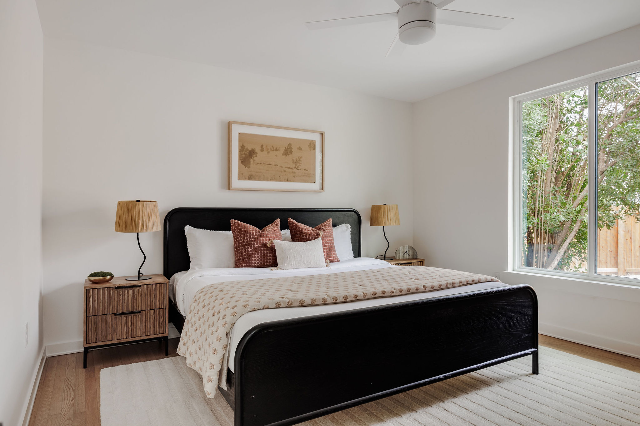 4515 Bull Creek Road Austin, TX 78731 - Photo 24 of 33 A spacious secondary bedroom with large windows and a calm