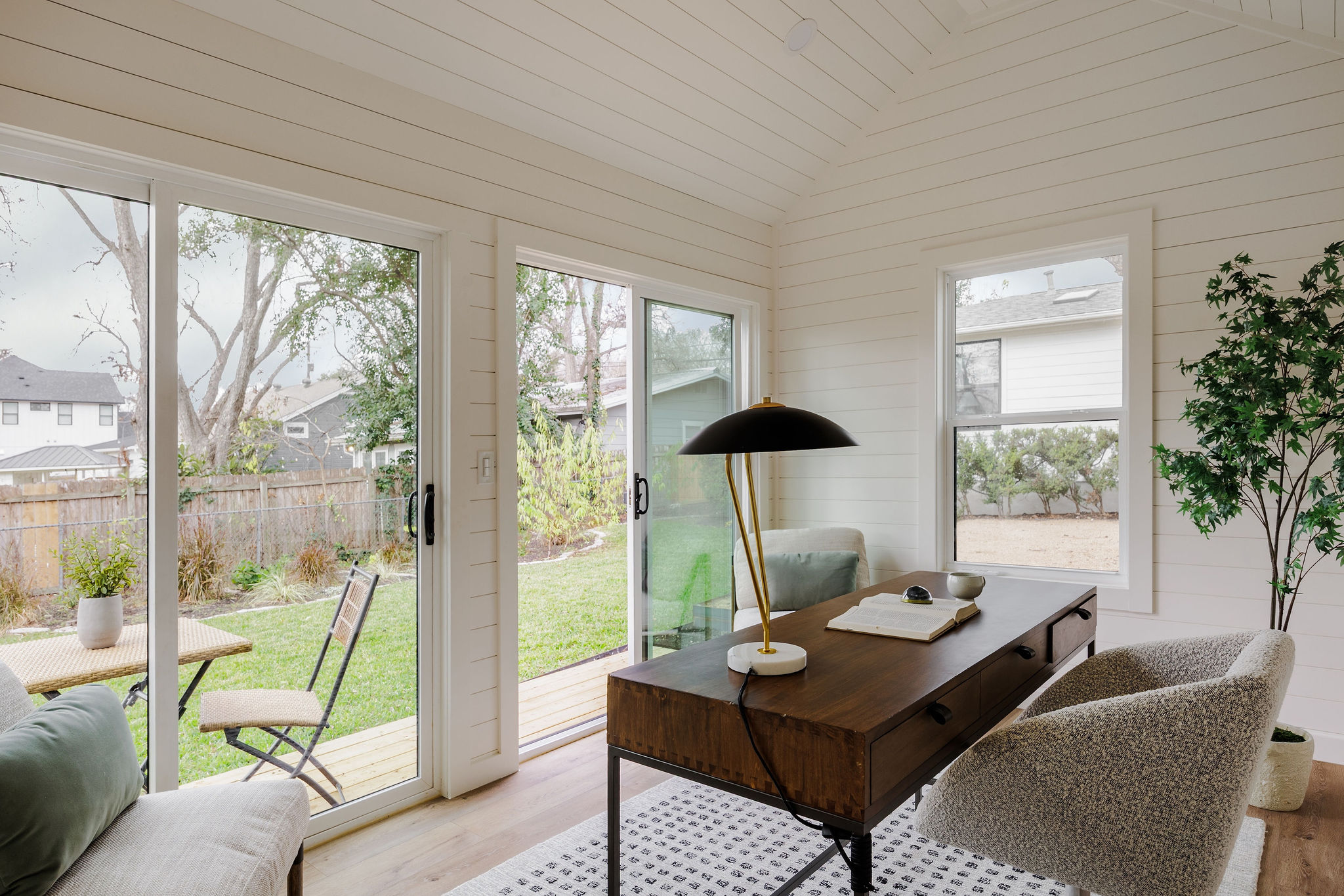 4515 Bull Creek Road Austin, TX 78731 - Photo 30 of 33 Light-filled studio with shiplap walls, insulated comfort, and mini-split HVAC