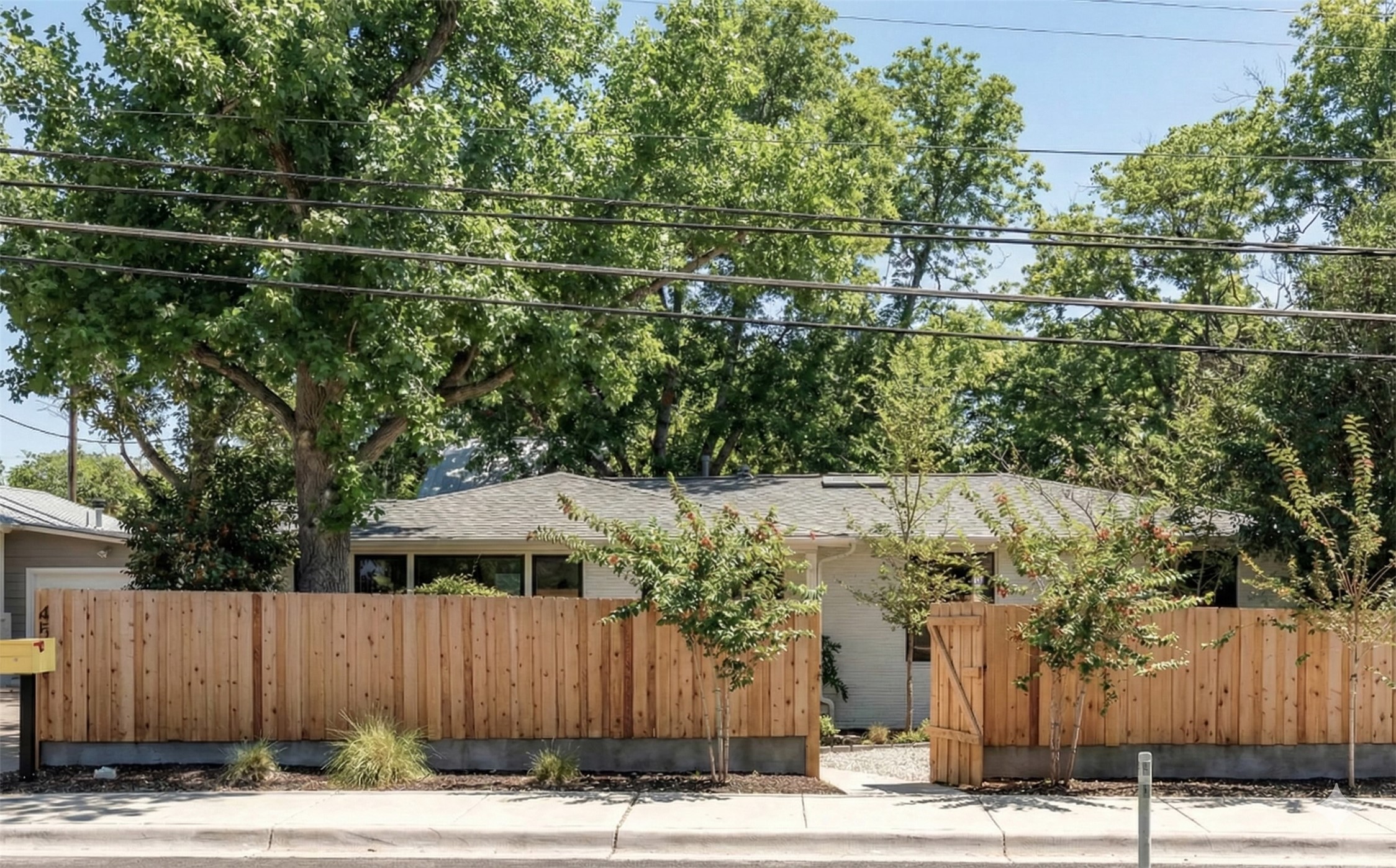 4515 Bull Creek Road Austin, TX 78731 - Photo 4 of 33 Front of structure in Summertime