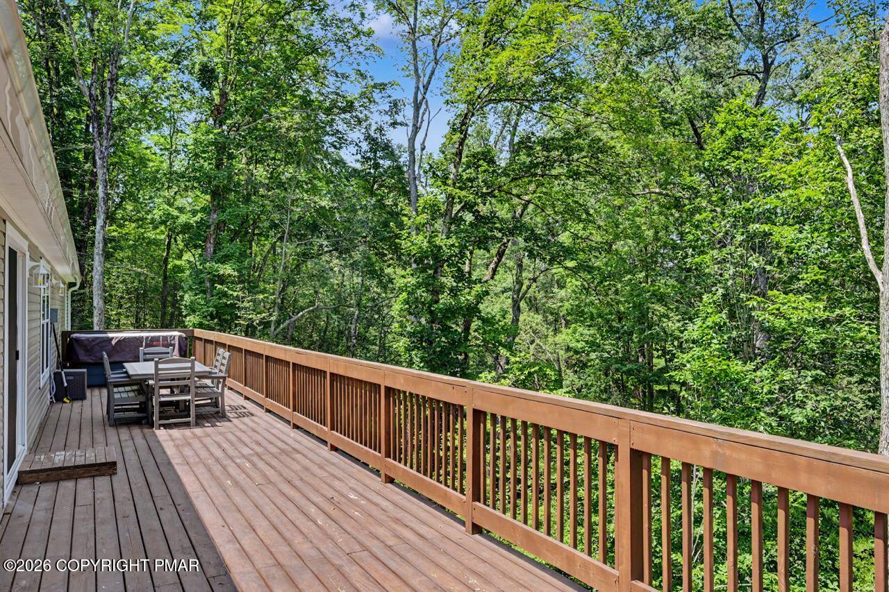 2016 Locust Ridge Road Pocono Lake, PA 18347 - Photo 77 of 82 a view of balcony with deck and wooden floor