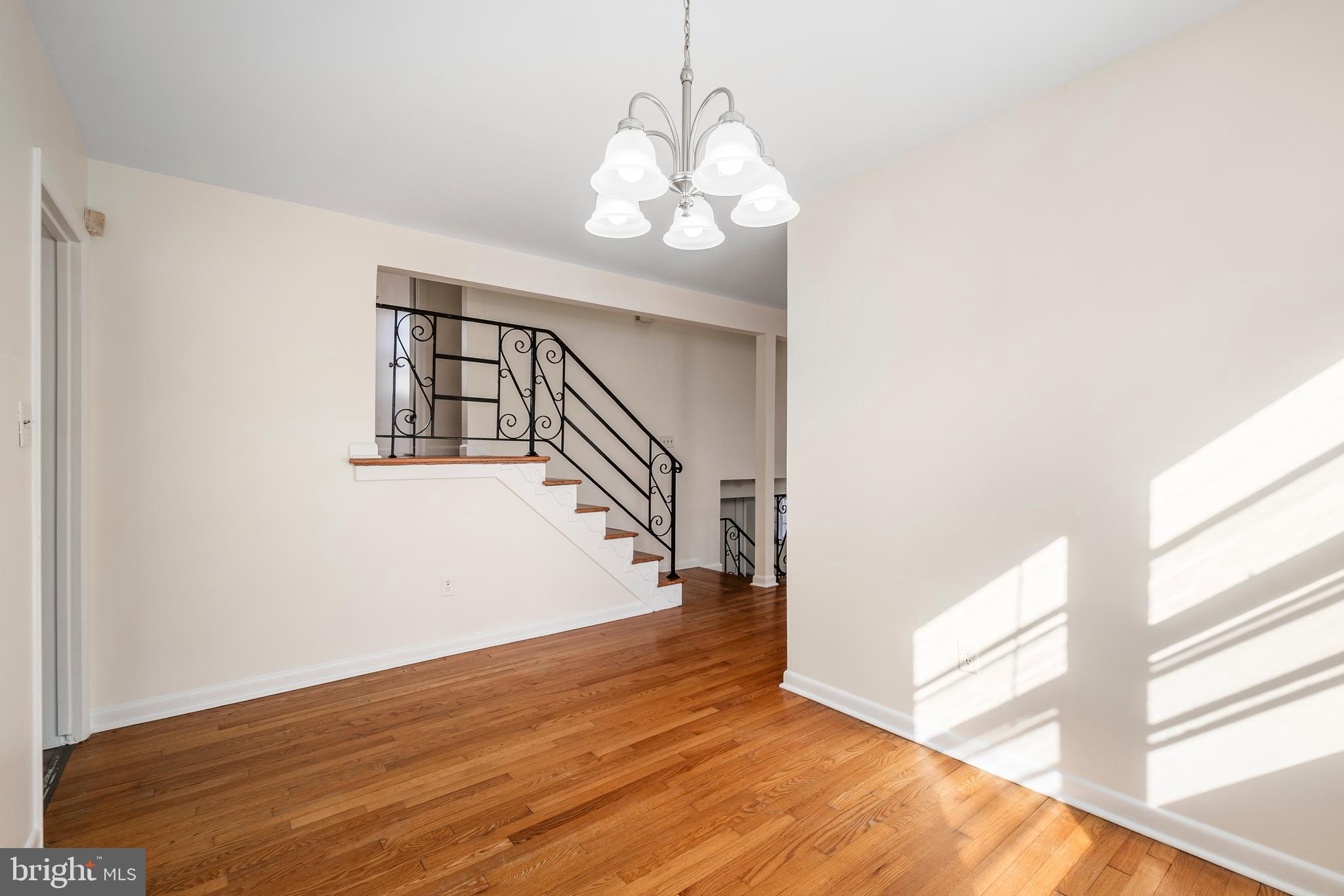 4208 16th Street Northwest Washington, DC 20011 - Photo 11 of 47 a view of entryway and hall with wooden floor