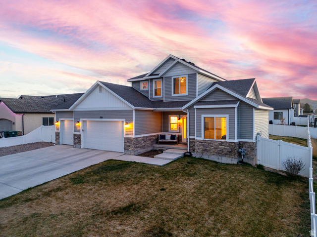 836 South 250 West Vernal, UT 84078 - Photo 1 of 56 Modern two-story residence featuring gray siding and stone accents