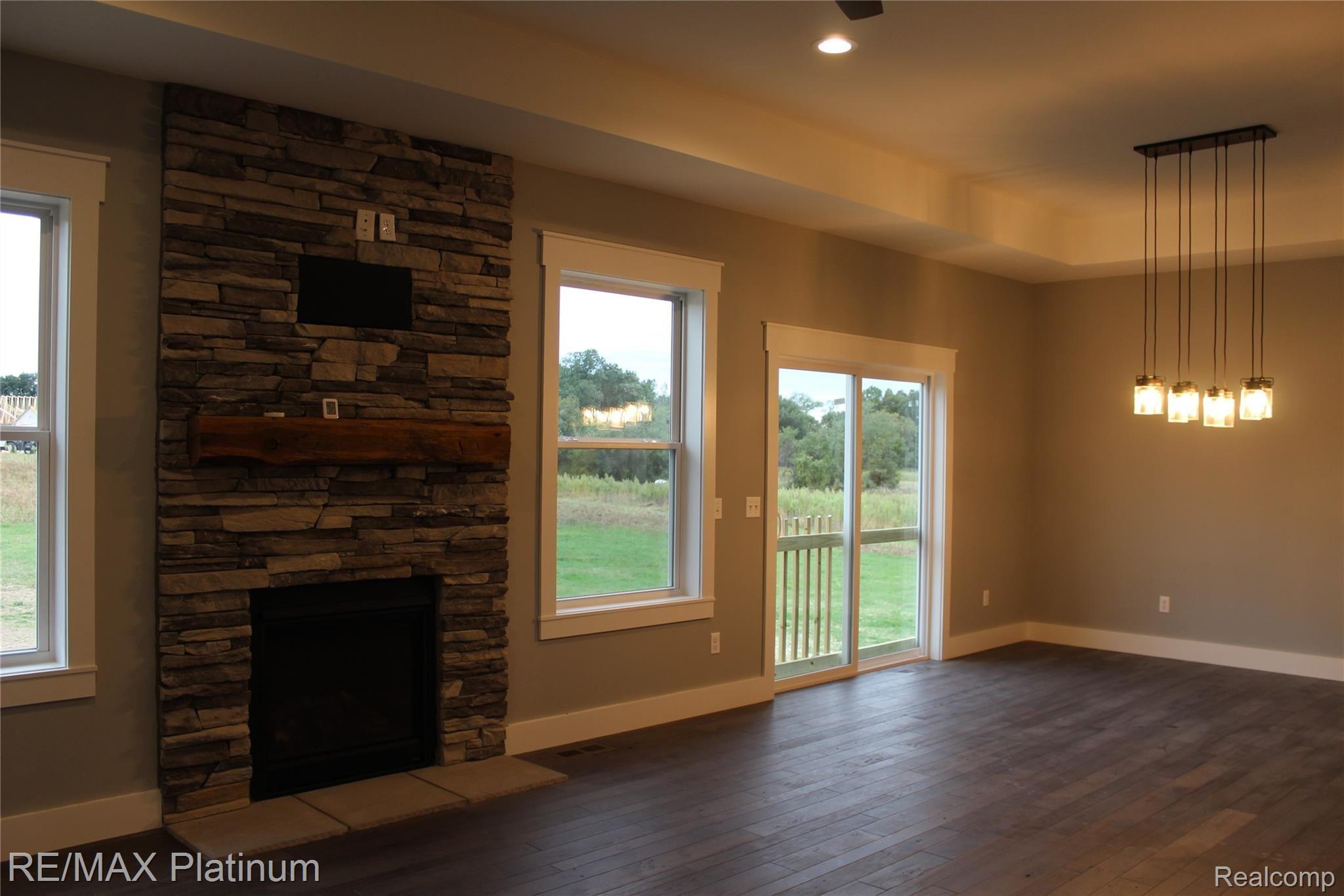 11230 Germany Road Fenton, MI 48430 - Photo 9 of 15 Doorwall off dining, hardwood floors