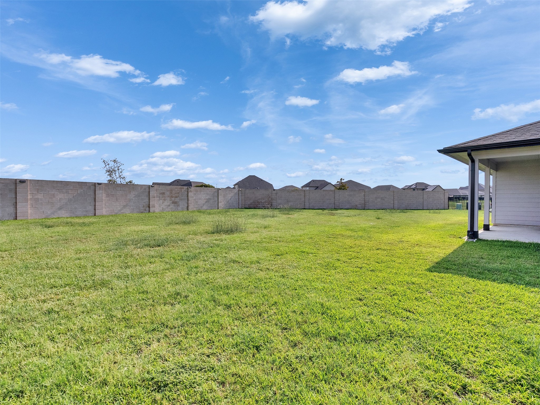 10627 Great Basin Drive Rosharon, TX 77583 - Photo 28 of 42 a view of a house with a garden and a yard