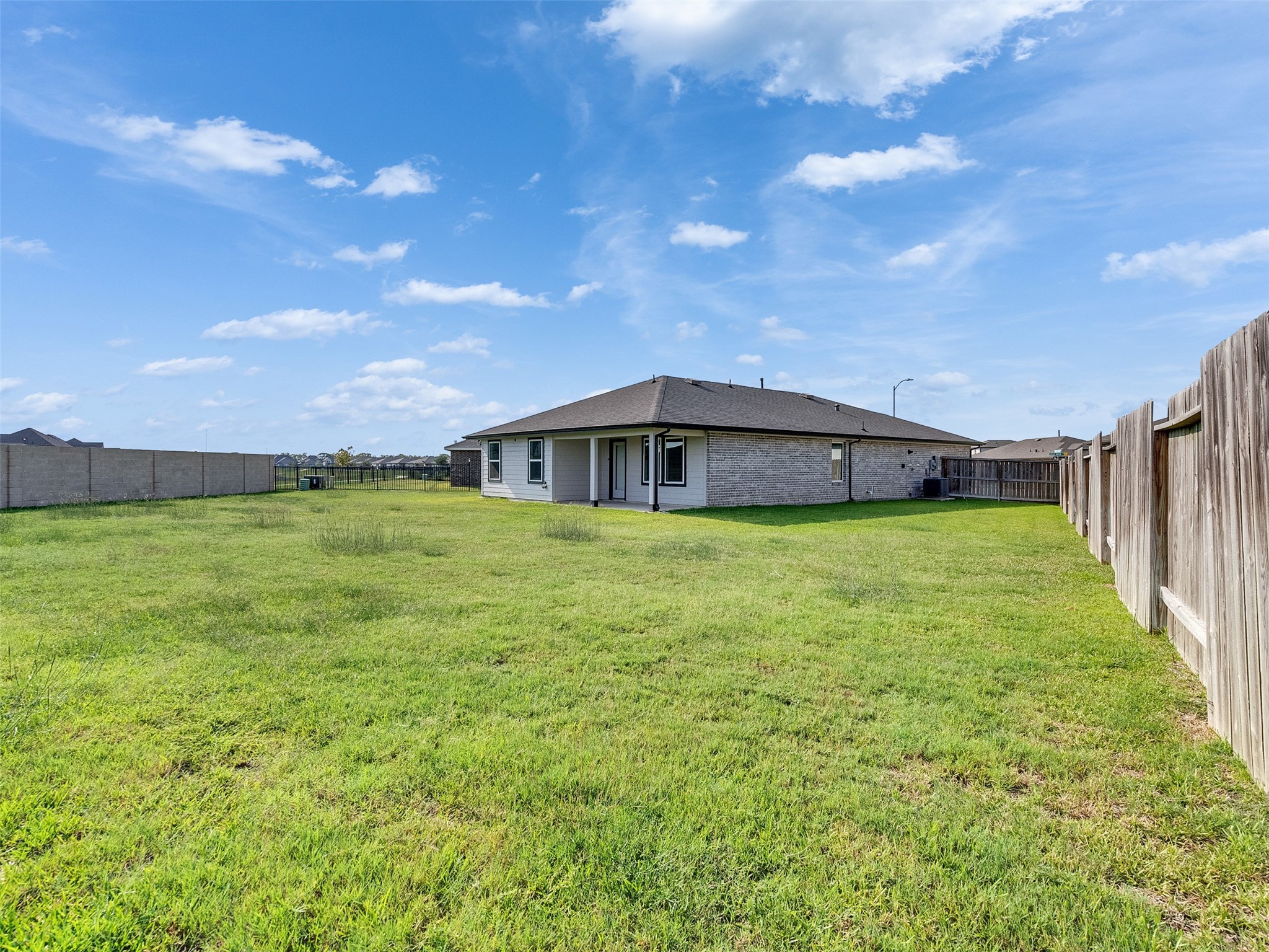 10627 Great Basin Drive Rosharon, TX 77583 - Photo 29 of 42 a house view with swimming pool in front of it