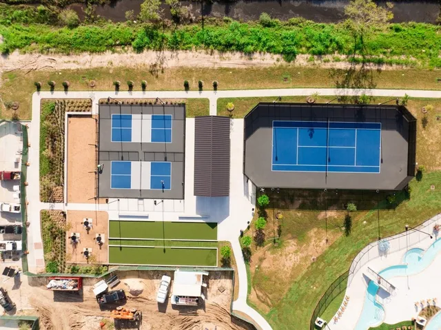 a aerial view of a house with a lake view