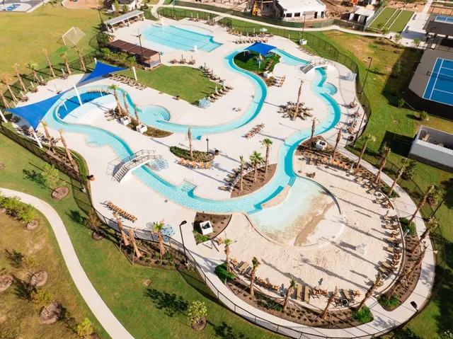 an aerial view of a swimming pool