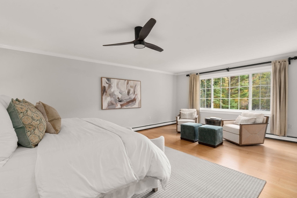 267 Dedham Street Dover, MA 02030 - Photo 24 of 35 a bedroom with a large bed and a window