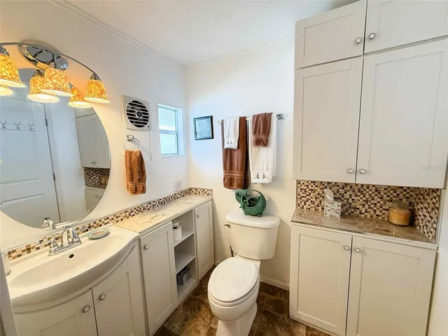 a view of storage and utility room with washer and dryer