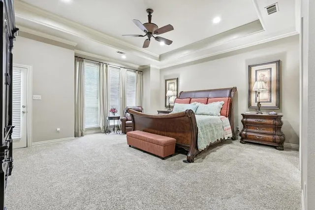 a bed room with a bed and a couch