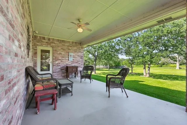 a view of a house with a big yard