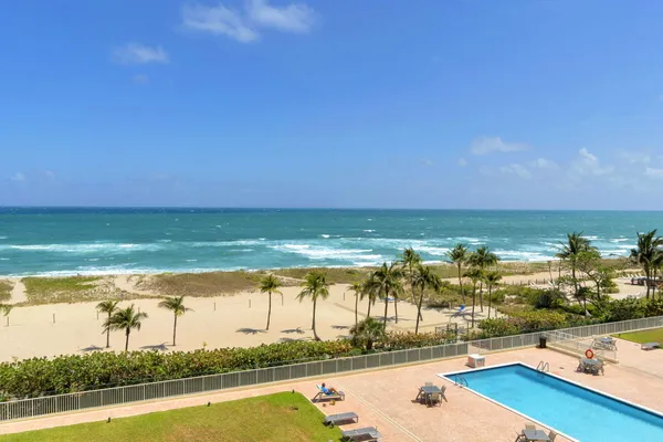 a view of an ocean and a building