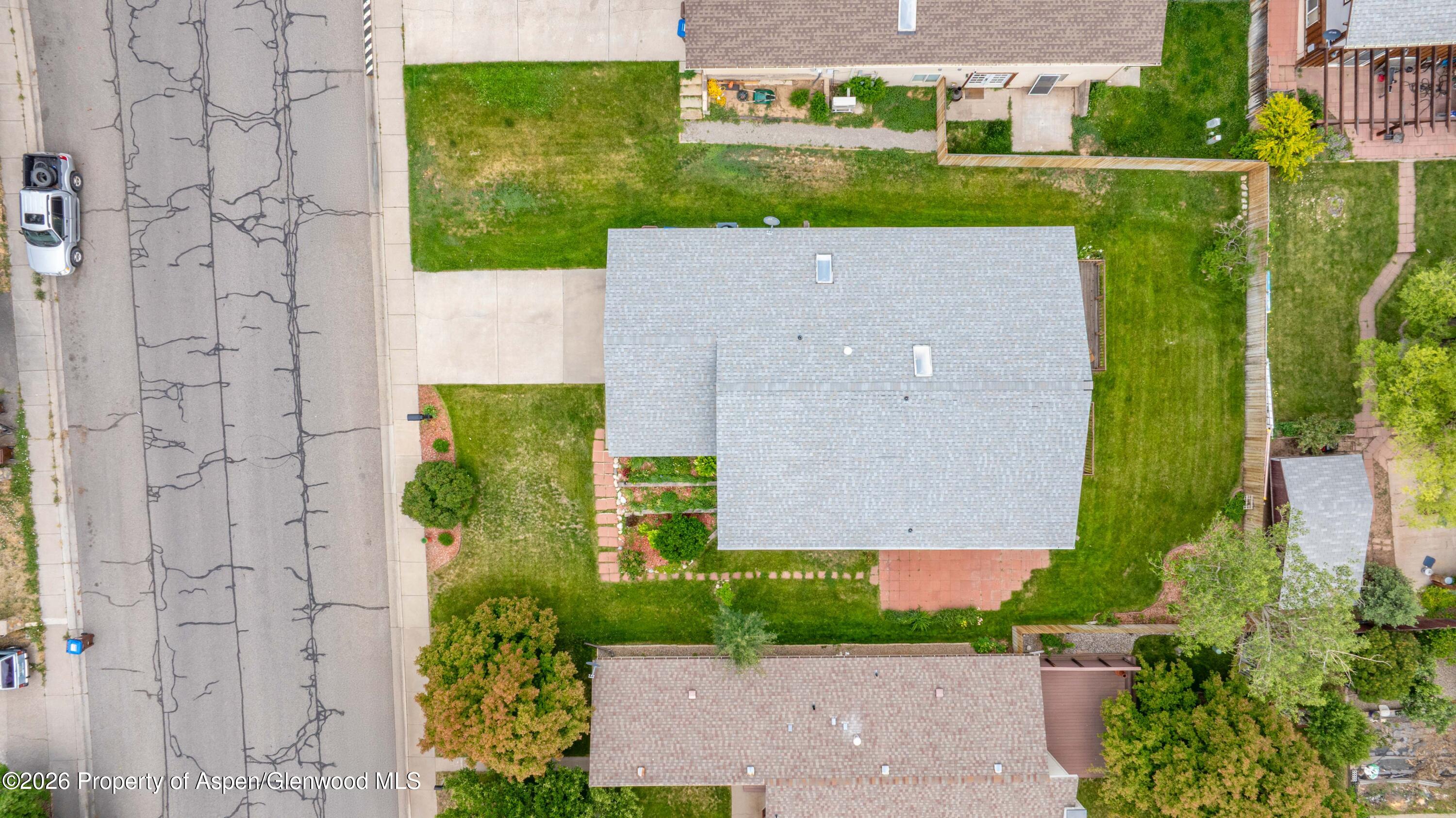 660 Aspen Avenue Rifle, CO 81650 - Photo 30 of 30 an aerial view of a house with a garden and outdoor space
