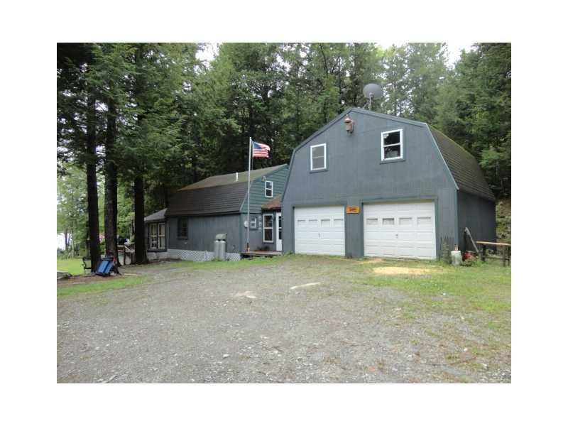 120 Seymour Cove Road Dover-Foxcroft, ME 04426 - Photo 18 of 19 Exterior Front. Two car garage with...