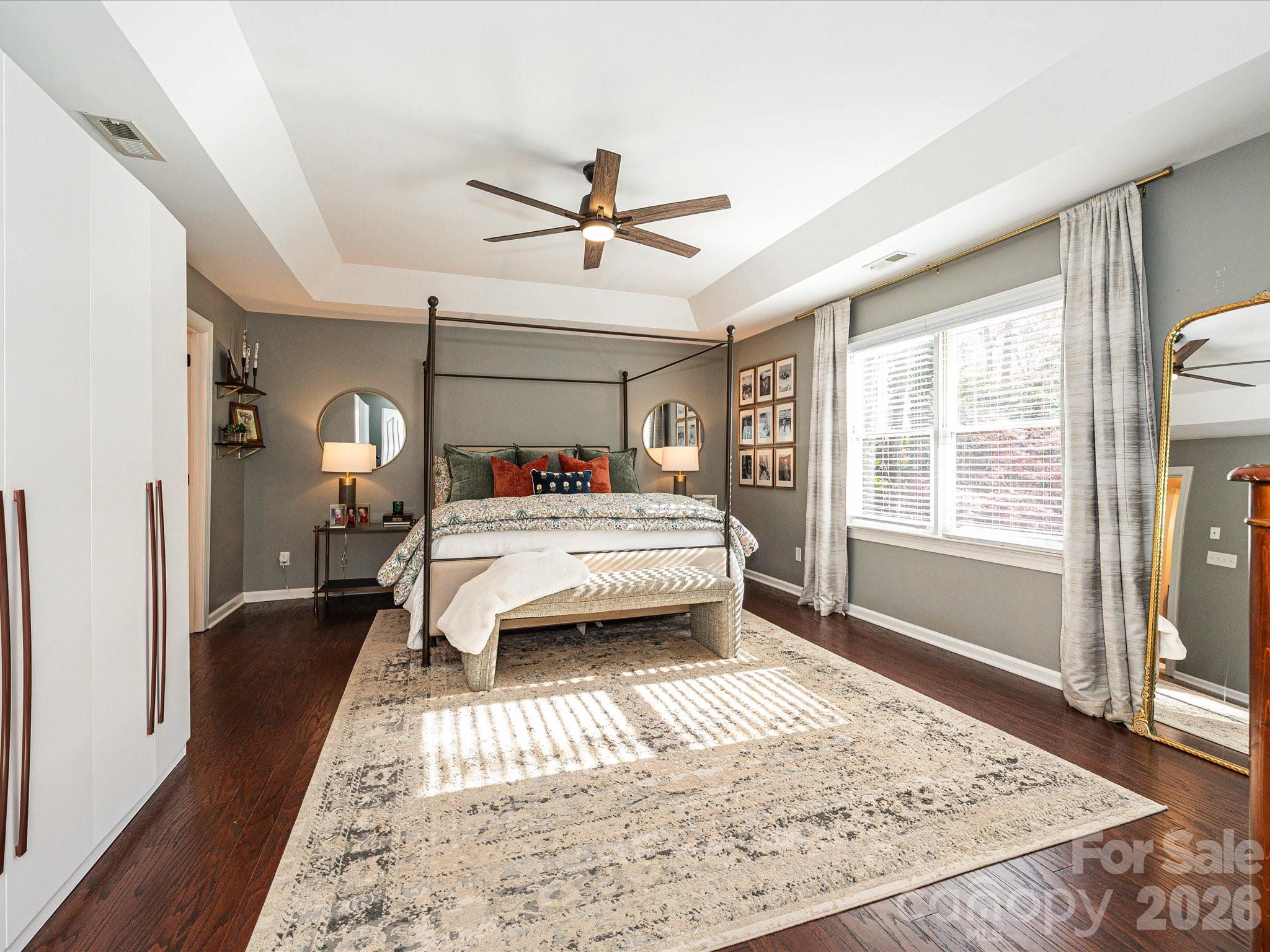4540 Forest Cove Road Belmont, NC 28012 - Photo 16 of 46 a bedroom with a bed and a large window