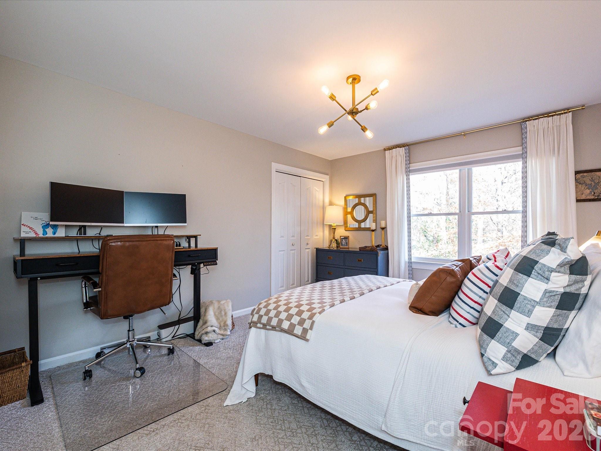 4540 Forest Cove Road Belmont, NC 28012 - Photo 21 of 46 a bedroom with a bed and a window