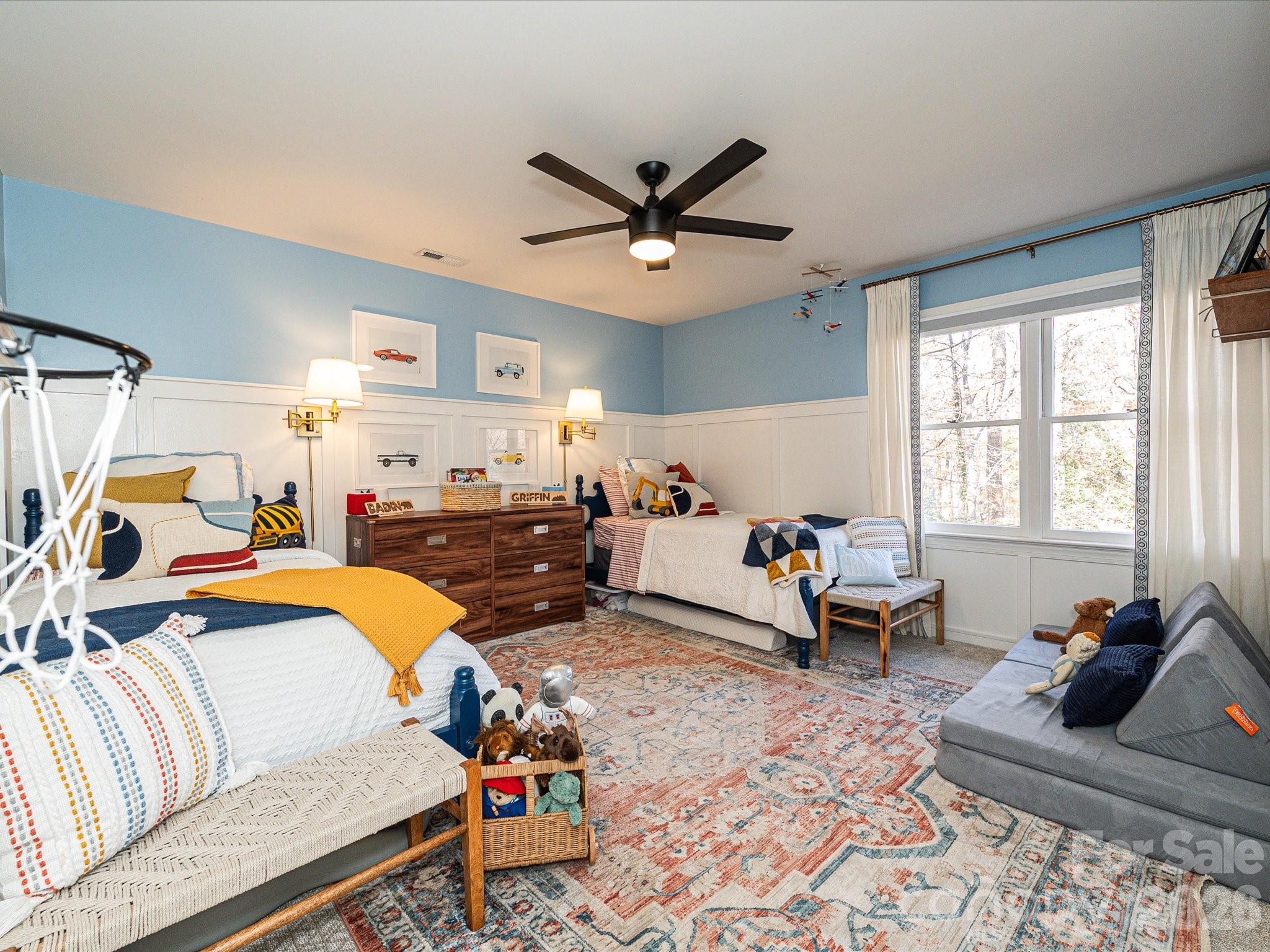 4540 Forest Cove Road Belmont, NC 28012 - Photo 24 of 46 a bedroom with furniture and a large window