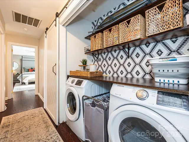 a utility room with dryer and washer