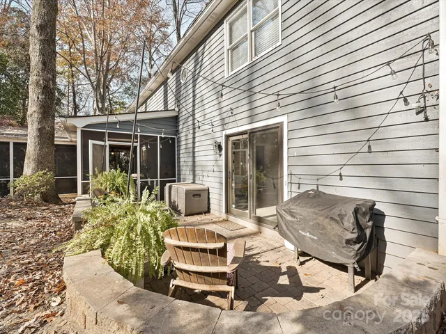 a view of backyard with outdoor seating