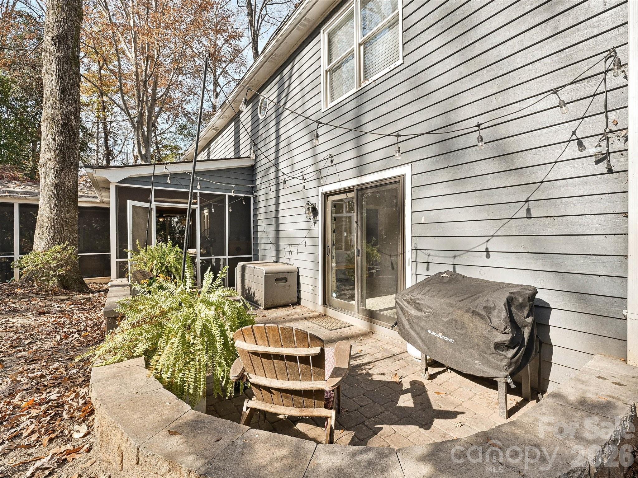 4540 Forest Cove Road Belmont, NC 28012 - Photo 30 of 46 a view of backyard with outdoor seating