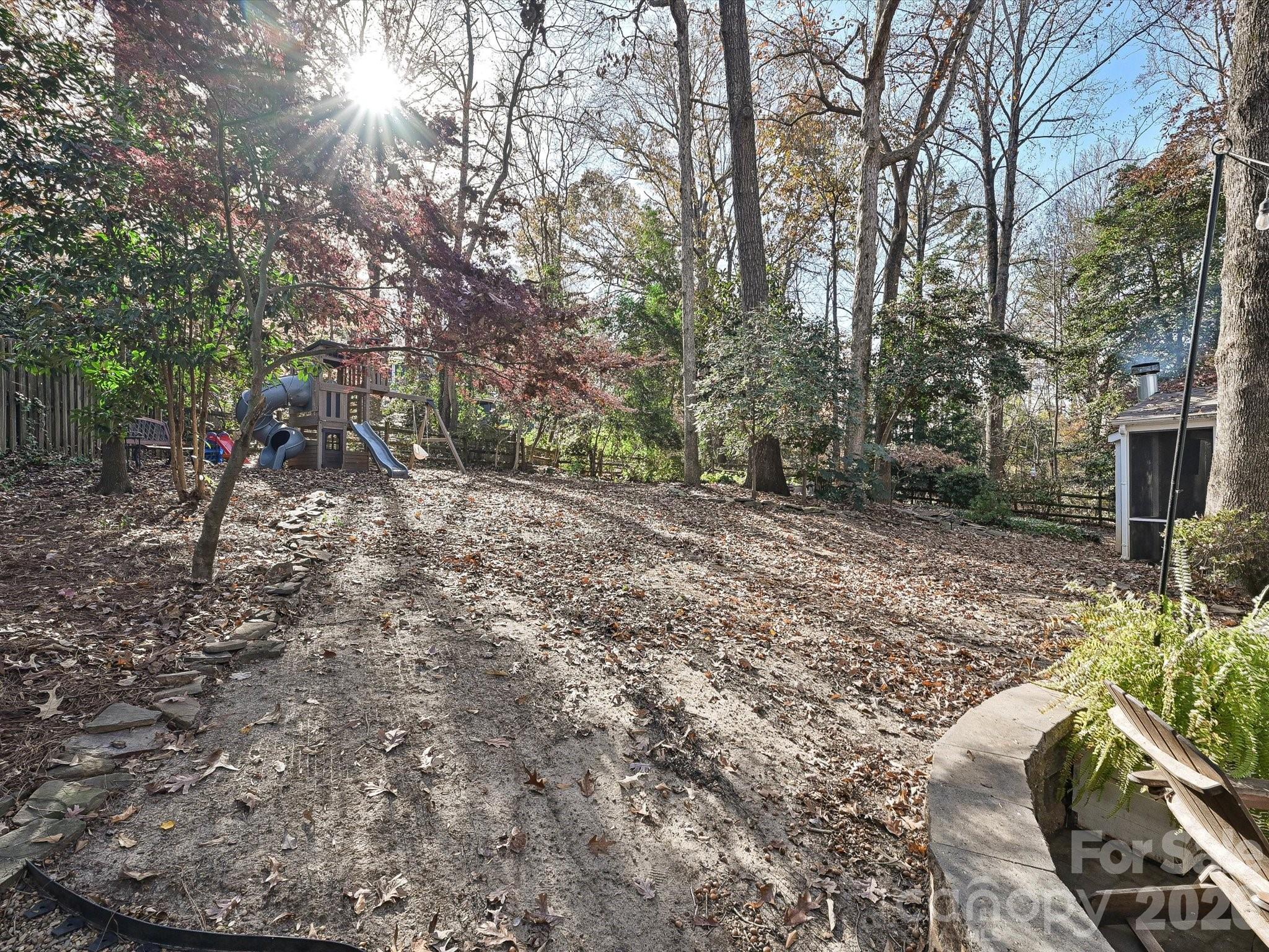 4540 Forest Cove Road Belmont, NC 28012 - Photo 31 of 46 a view of a backyard with large trees