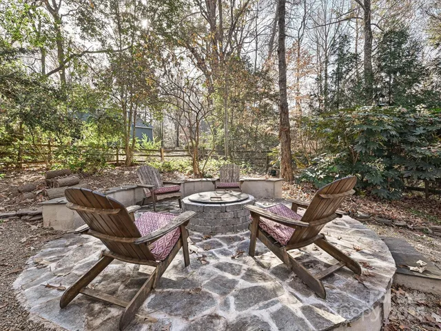 a view of a lounge chairs in the backyard