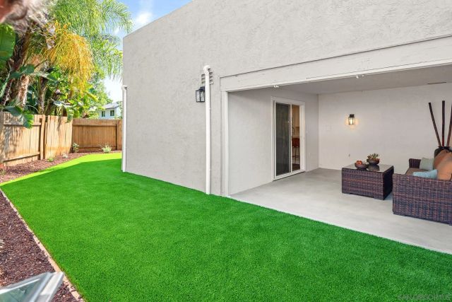 a house with trees in the background