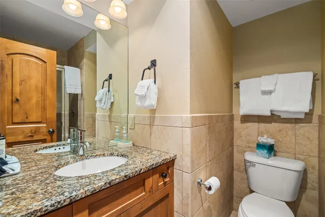 a view of balcony with wooden floor