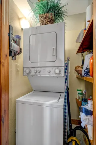 a view of a hallway with a window