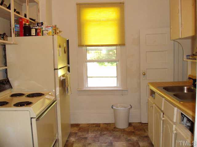 313 East Lee Street Raleigh, NC 27601 - Photo 4 of 8 a view of storage and utility room with a sink