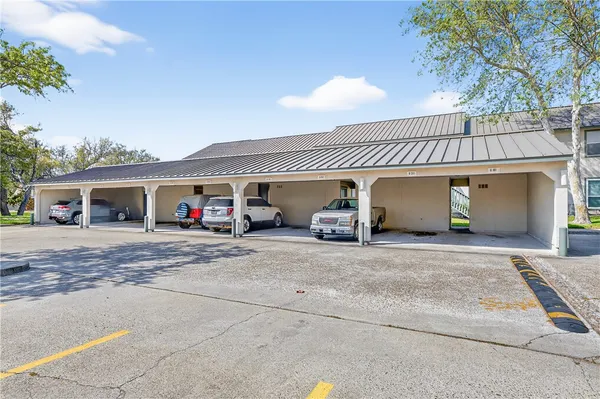 a view of a yard with a house and a garden