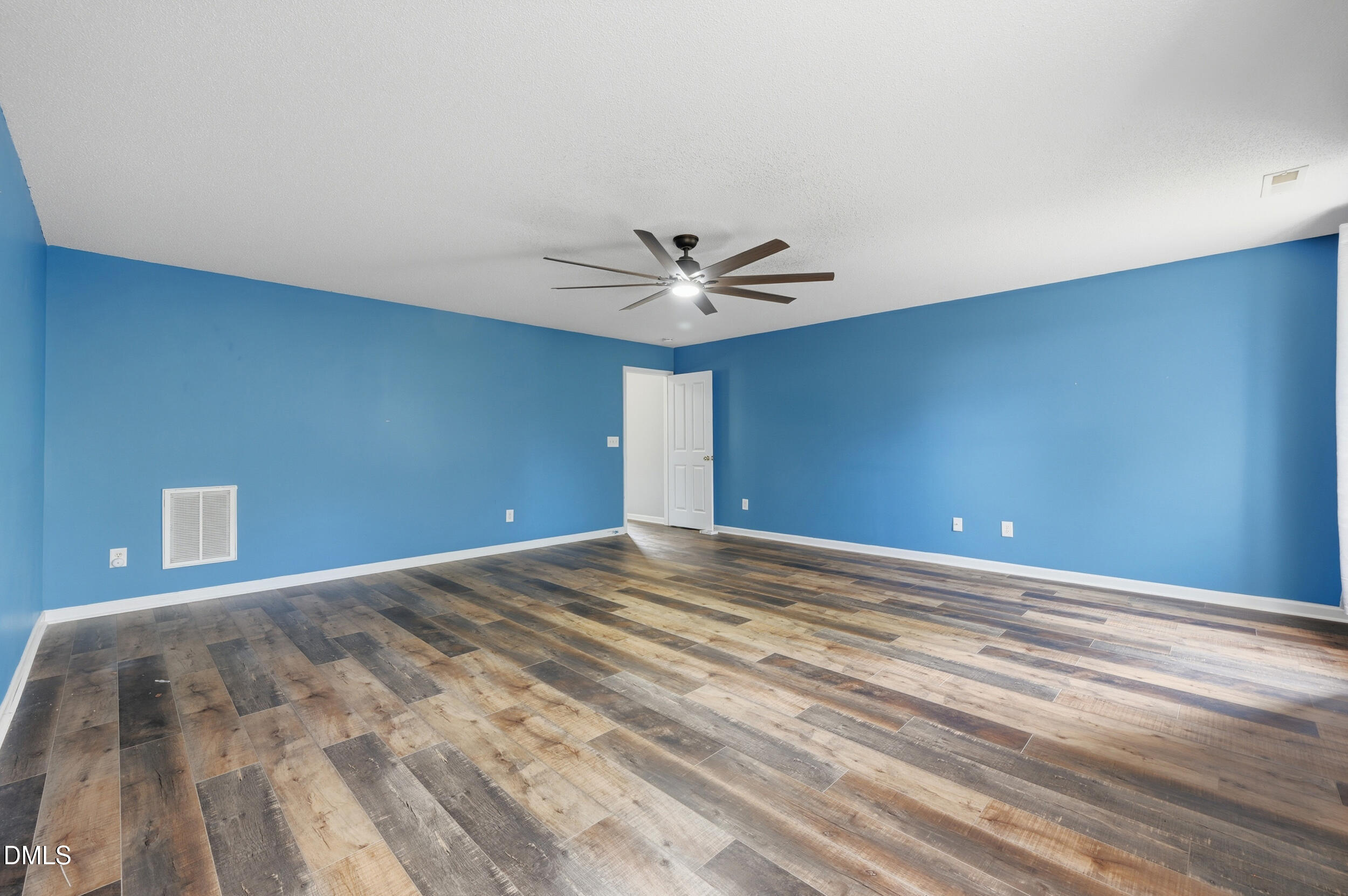 148 Brockton Ridge Drive Garner, NC 27529 - Photo 21 of 39 a view of a room with a ceiling fan