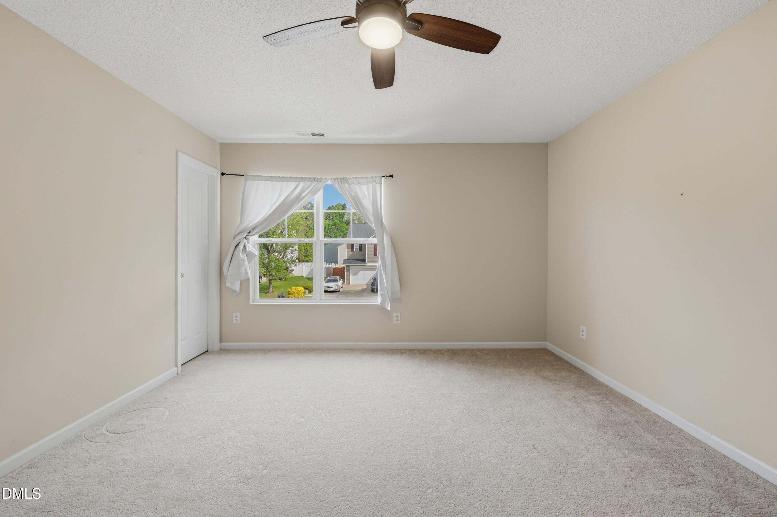 148 Brockton Ridge Drive Garner, NC 27529 - Photo 26 of 39 an empty room with windows