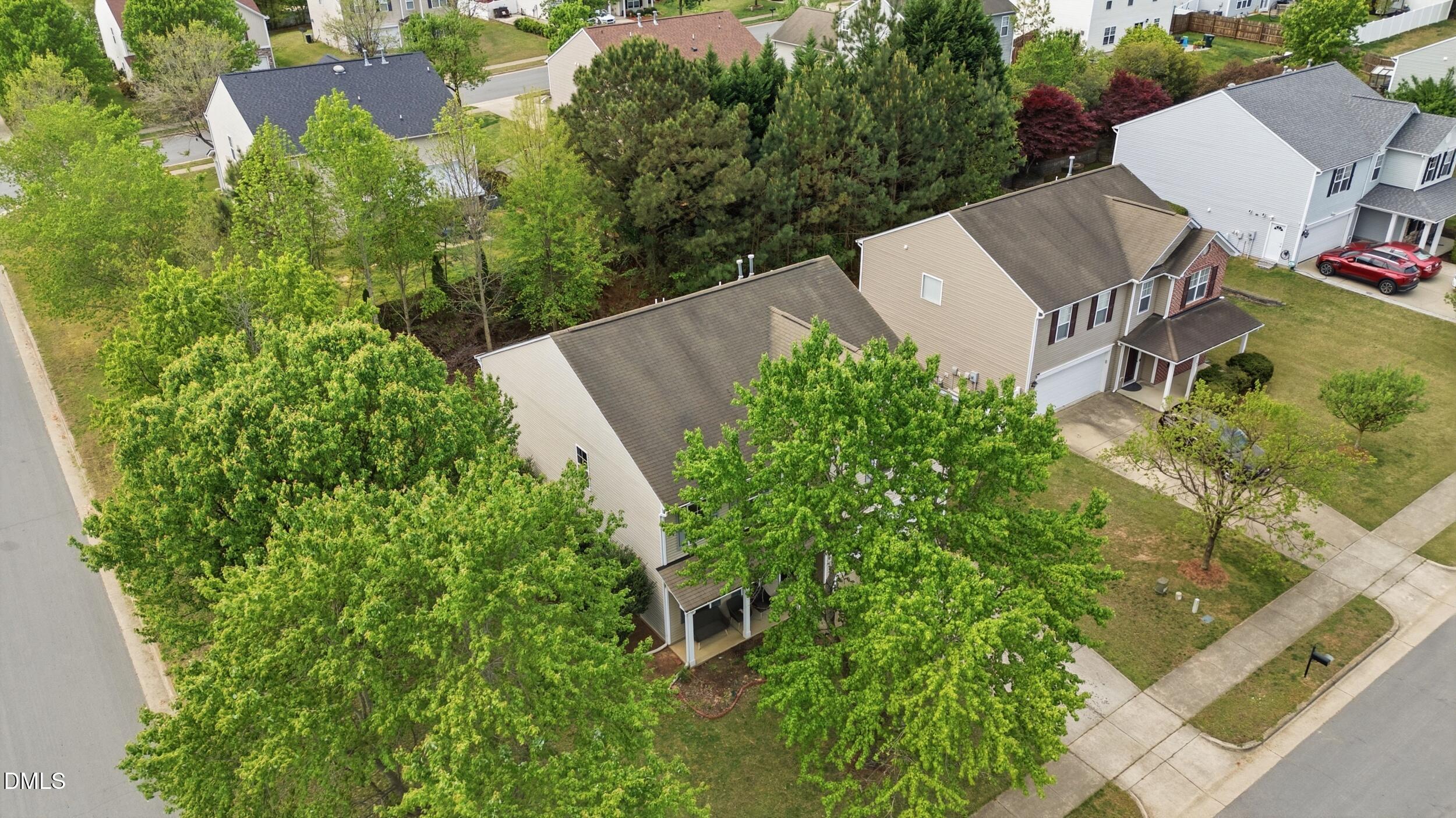 148 Brockton Ridge Drive Garner, NC 27529 - Photo 30 of 39 an aerial view of a house with garden space and street view