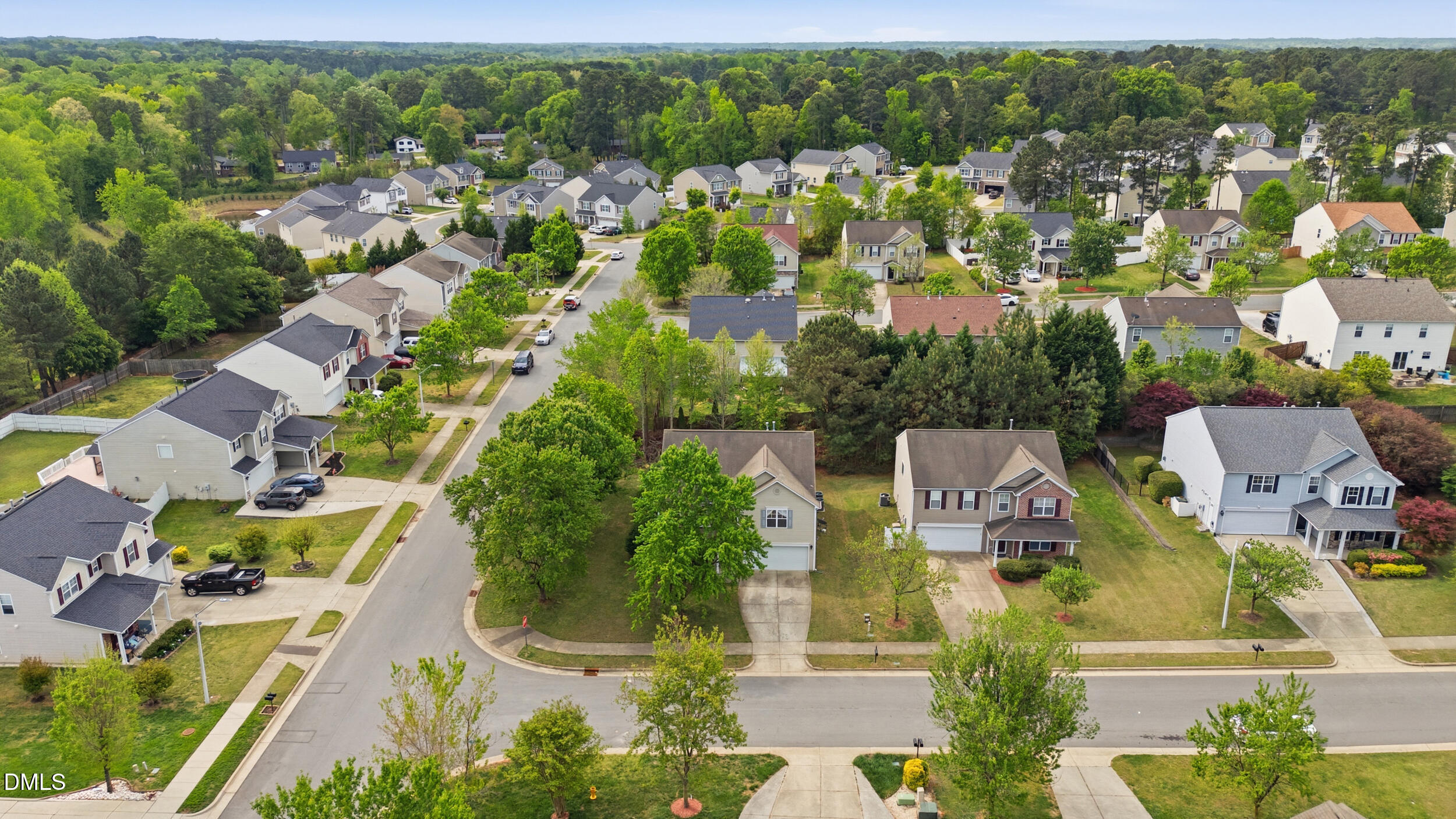 148 Brockton Ridge Drive Garner, NC 27529 - Photo 33 of 39 an aerial view of residential houses with outdoor space and parking