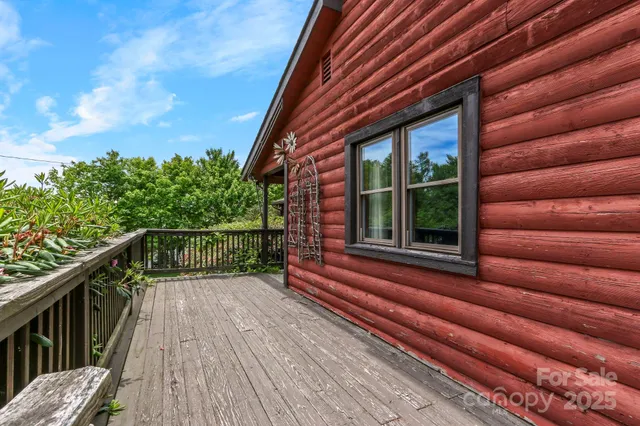 a balcony with view of a wooden floor