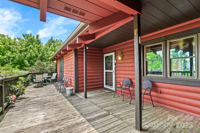 a backyard of a house with seating space