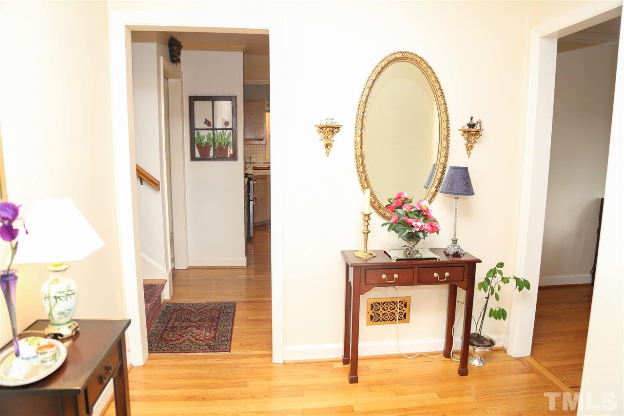 4800 Poland Place Raleigh, NC 27609 - Photo 14 of 30 a living room with furniture and a mirror