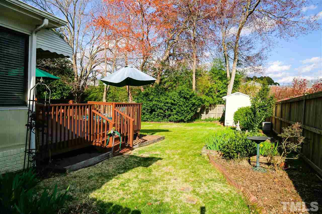4800 Poland Place Raleigh, NC 27609 - Photo 3 of 30 a view of a backyard with pathway